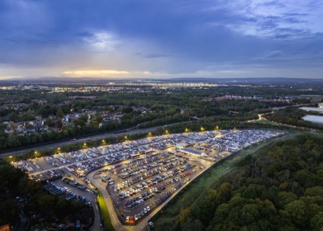 Aerial view of APH's new Gatwick parking facility on Copthorne Road at dusk